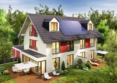 Modern house with solar panels on the roof.