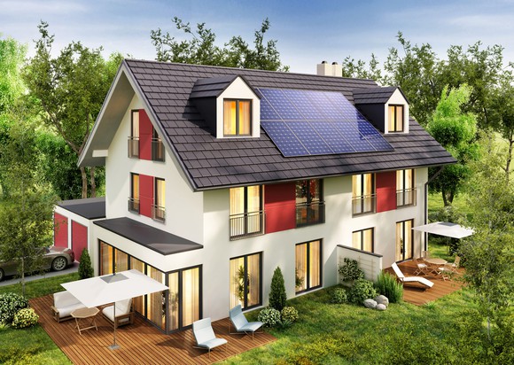 Modern house with solar panels on the roof.