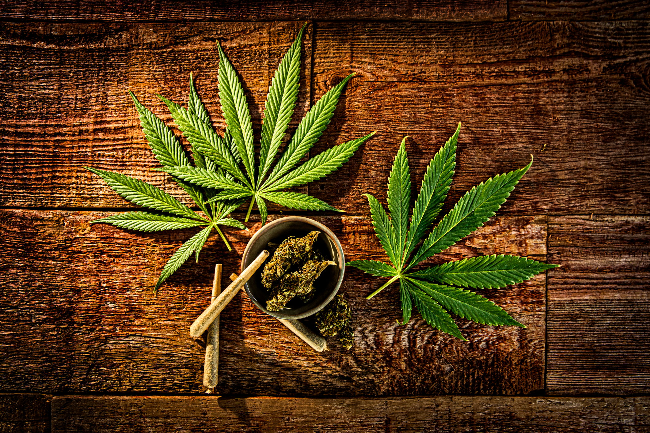 Marijuana leaves plus joints and flower.