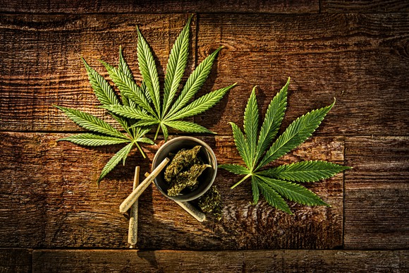 Marijuana leaves plus joints and flower.