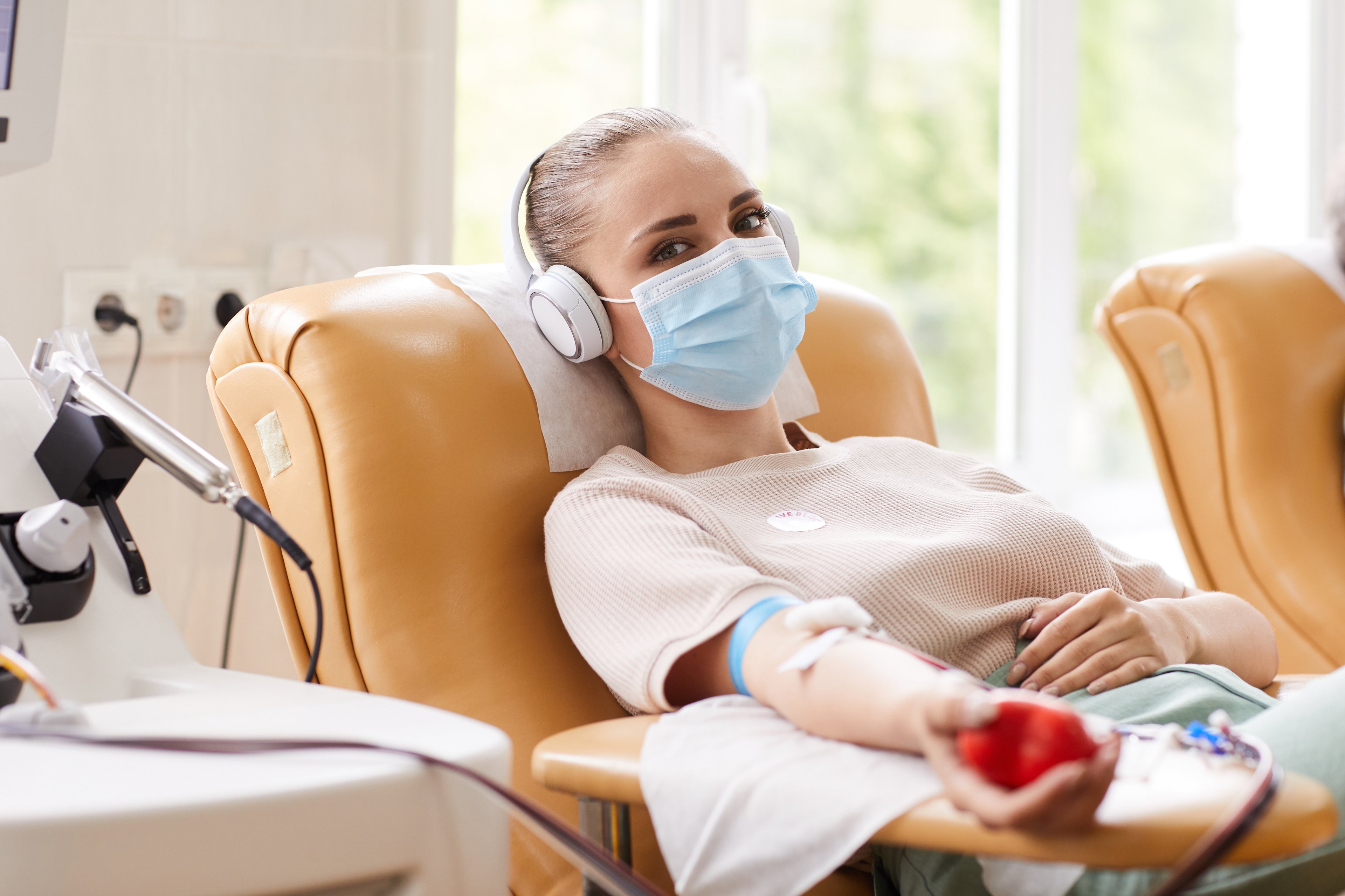 Woman receiving blood transfusion. 