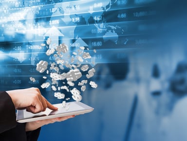 Finger touching tablet and dollar signs emerging.