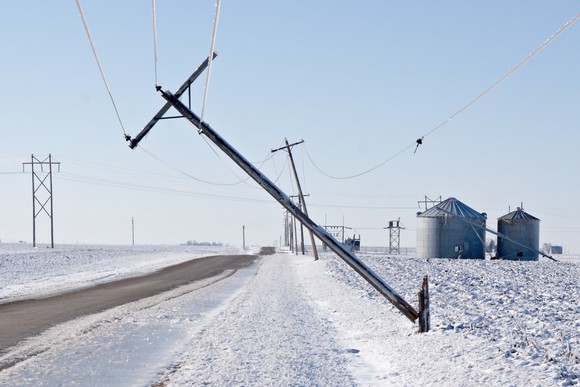 winter ice storm causing power lines to be down