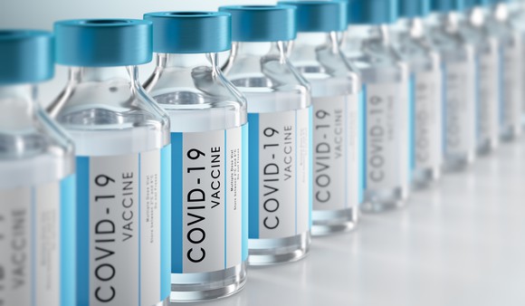Bottles of COVID-19 vaccines