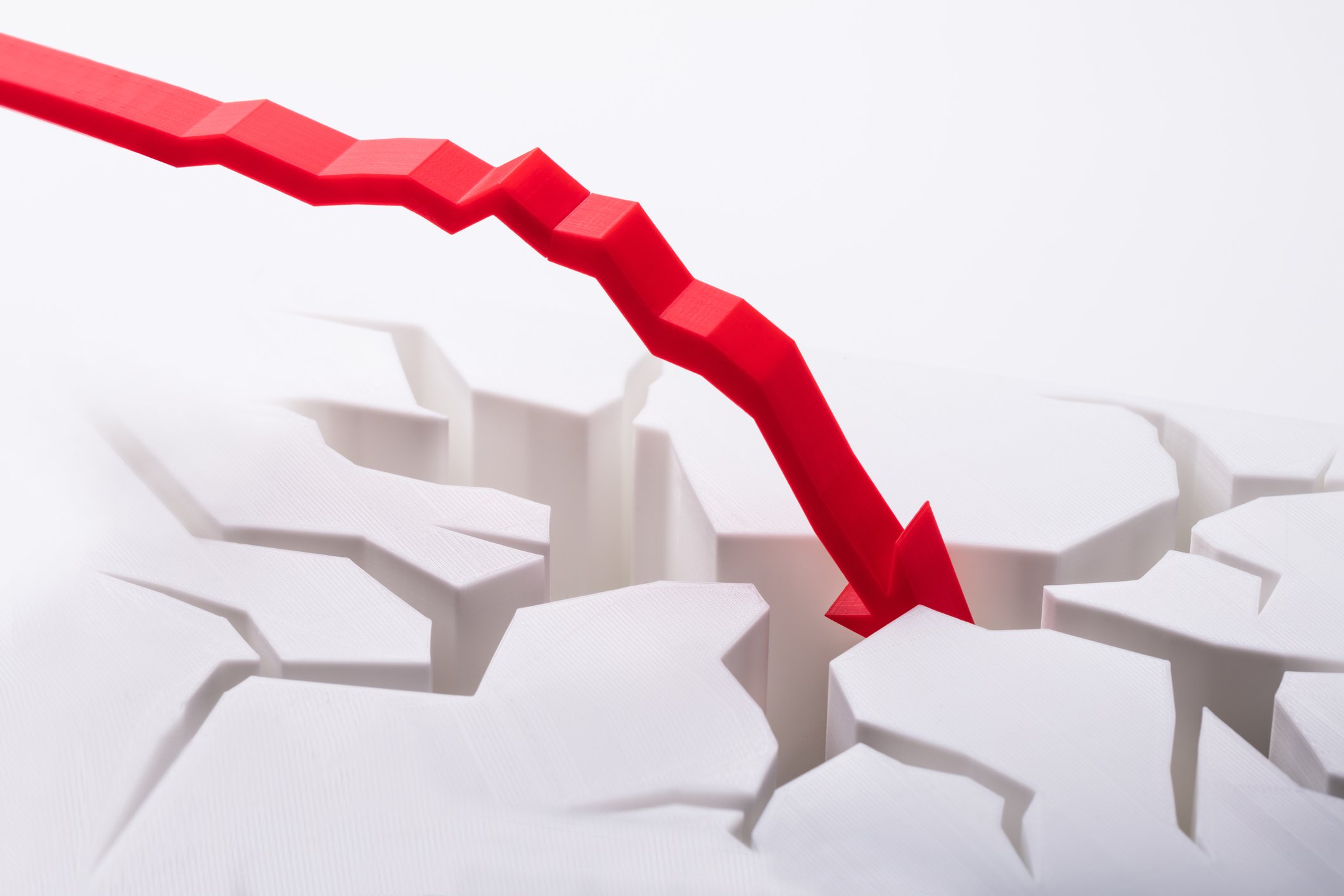 A red charting arrow crashes down, cracking the ground below it.