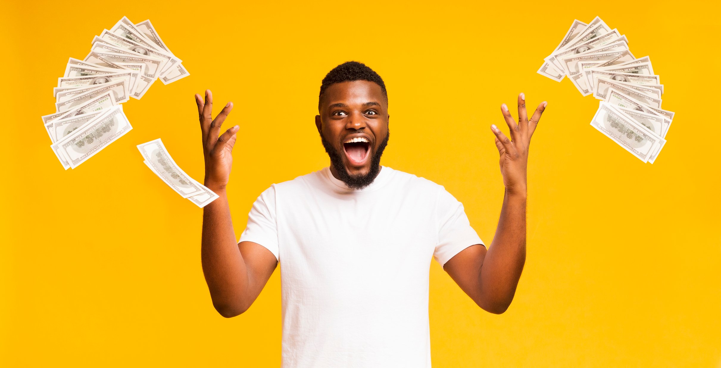 Man Throwing Money in the Air