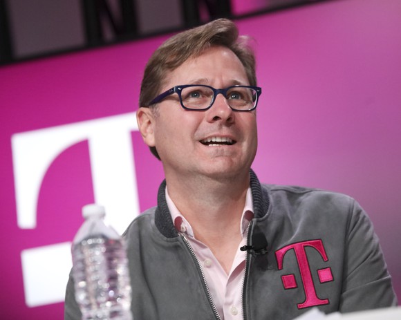 A man wearing a T-Mobile jacket.