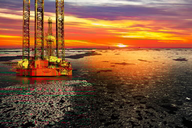 Offshore Drilling Rig Sunrise Over a Frozen Sea