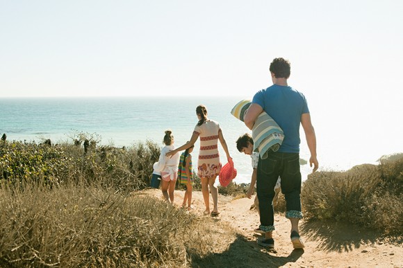 A family headed to the beach.