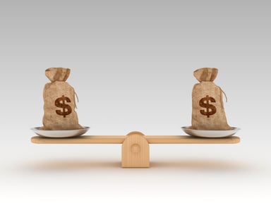 Seesaw with money bags