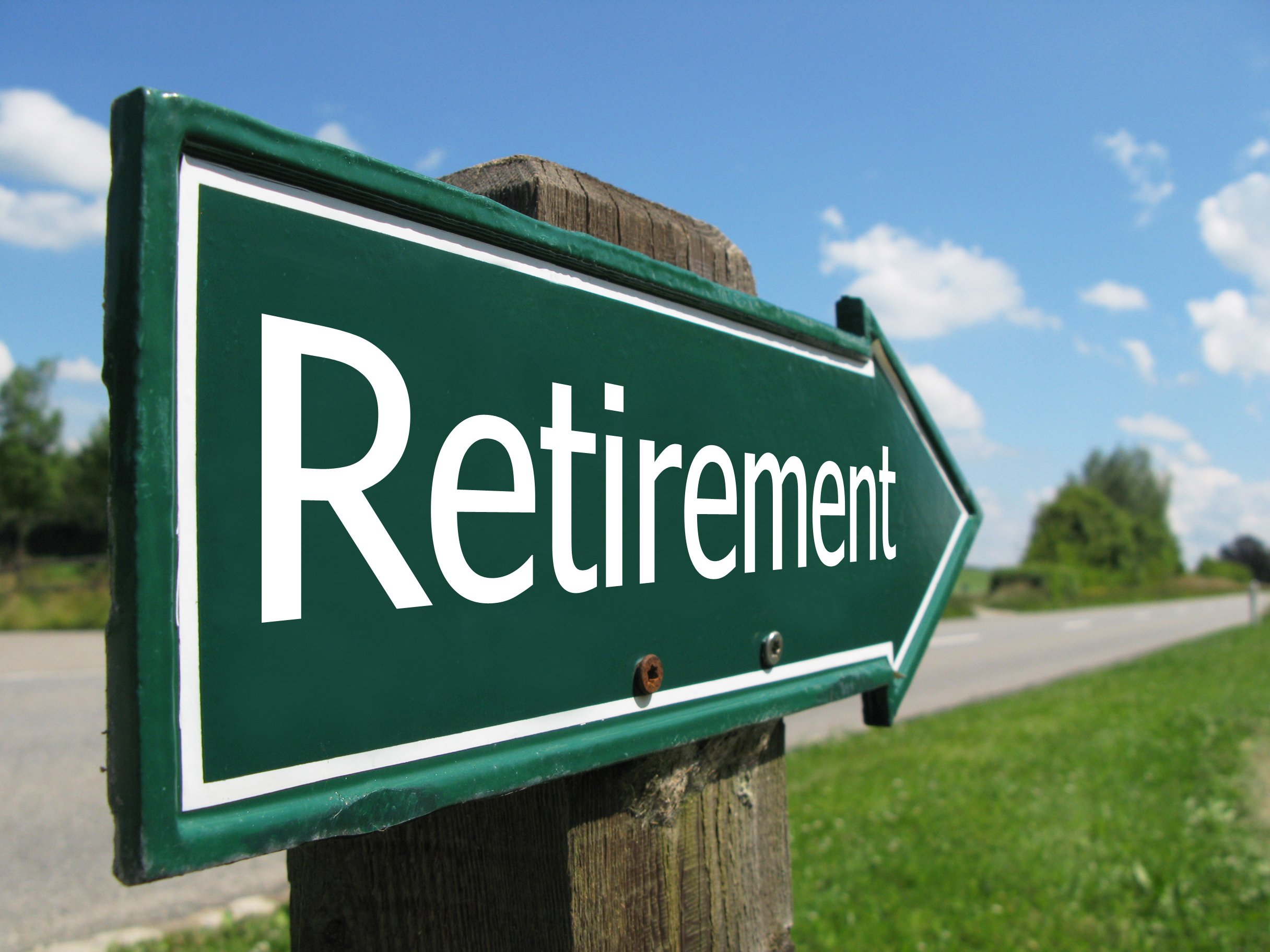 A green sign shaped like an arrow says retirement.