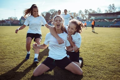 Women Celebrating Goal in Soccer