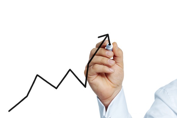 Hand drawing upward-pointing crooked arrow.