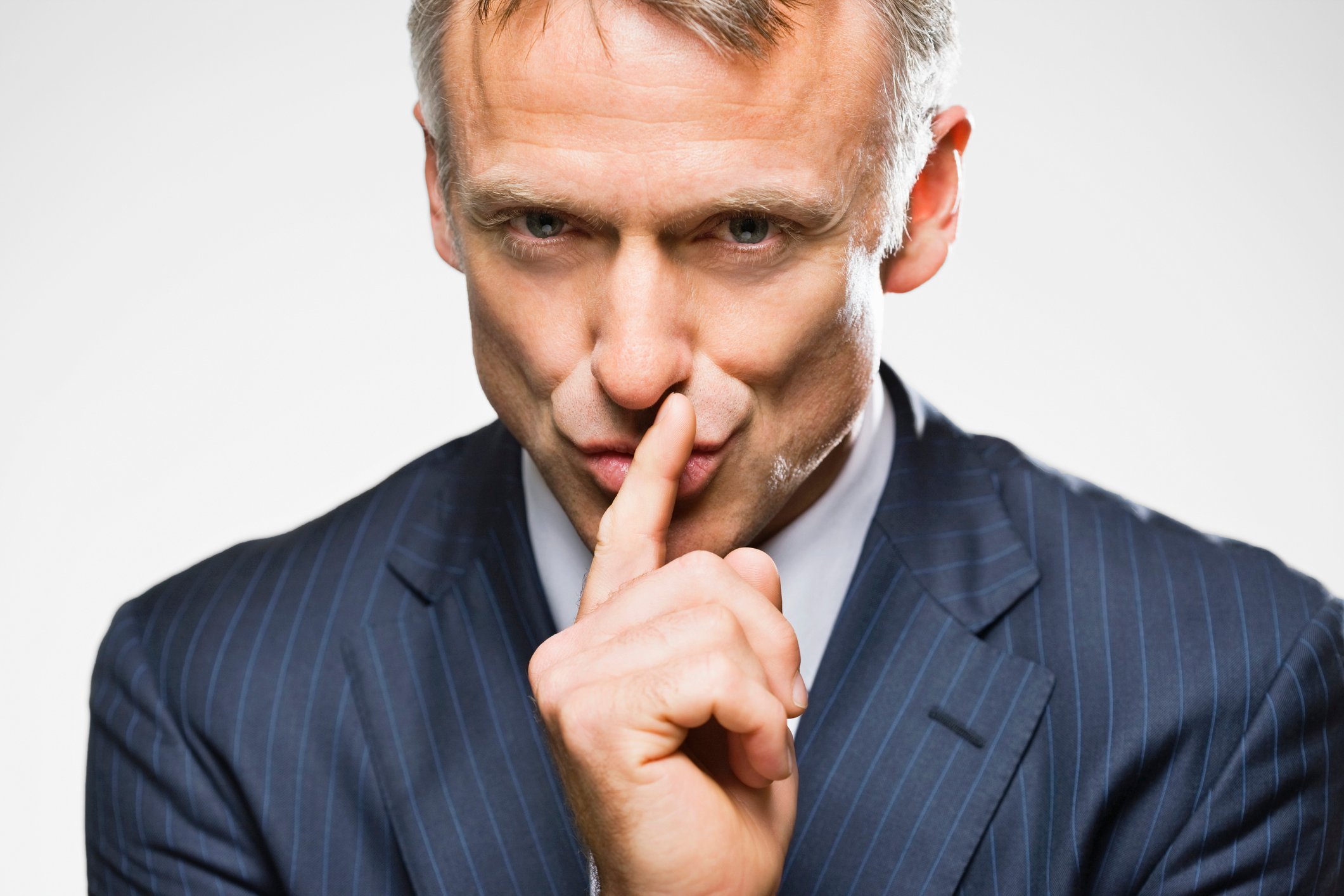 a man saying shhh - secret