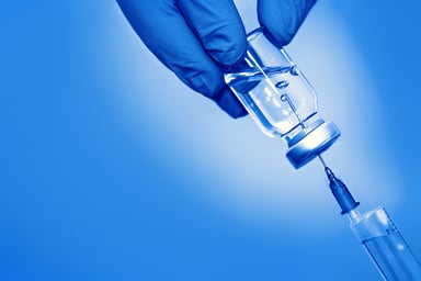 Vaccine vial and syringe