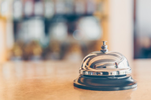 Bell at the front desk of a hotel. 