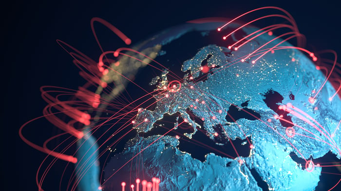 A map of Europe and Asia with lights implying communication between locations. 