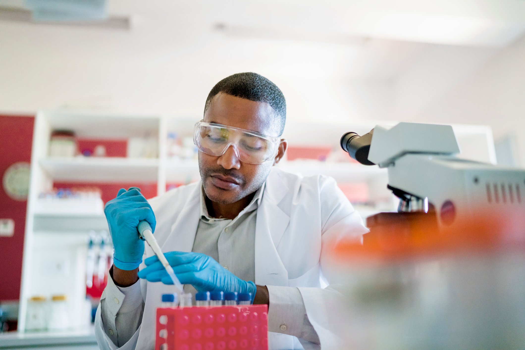 Scientist with pipette