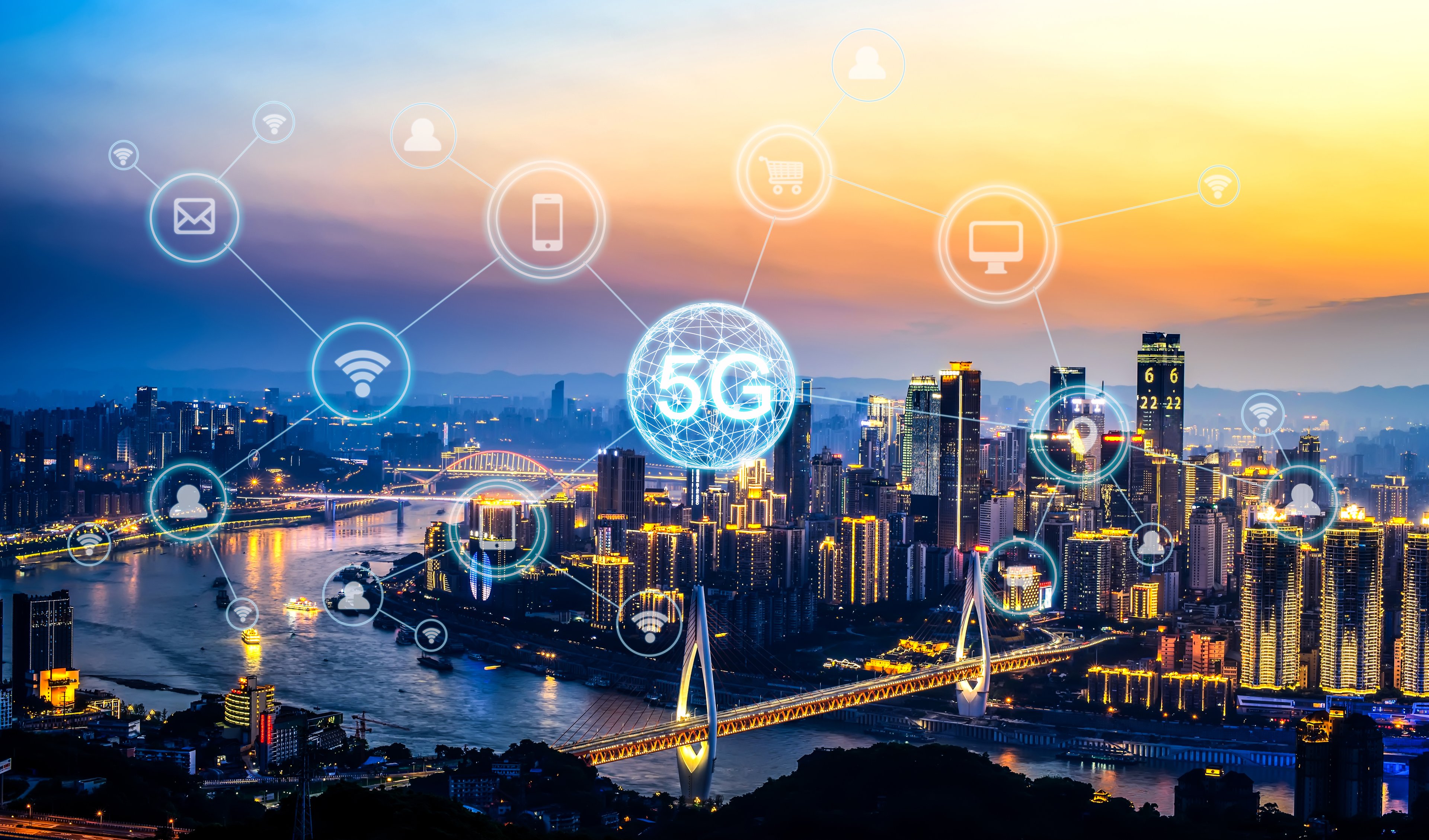 A city skyline. Bubbles containing "5G" and connected devices are illustrated in the sky.