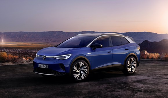 A blue Volkswagen ID.4, a compact electric crossover SUV. 