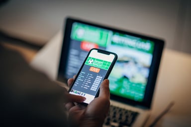 Person Making Sports Bet Online