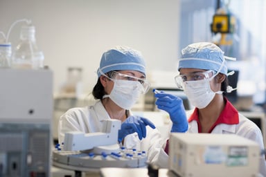 female researchers work in a lab