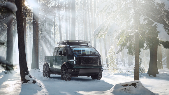 Canoo pickup truck  in snowy forest