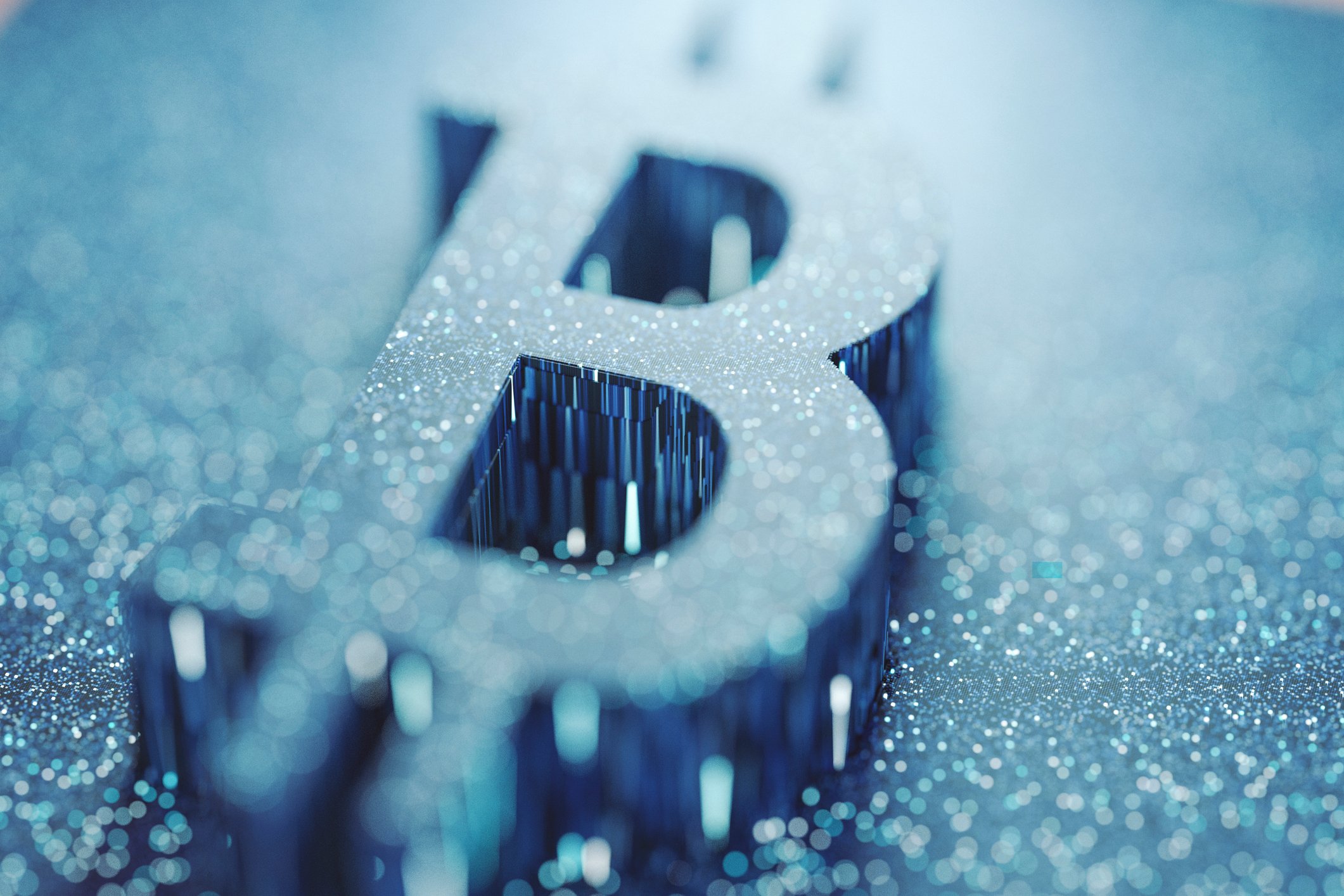 A 3-dimensional rendering of the Bitcoin symbol in blue.
