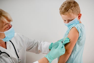 Boy receiving a vaccine
