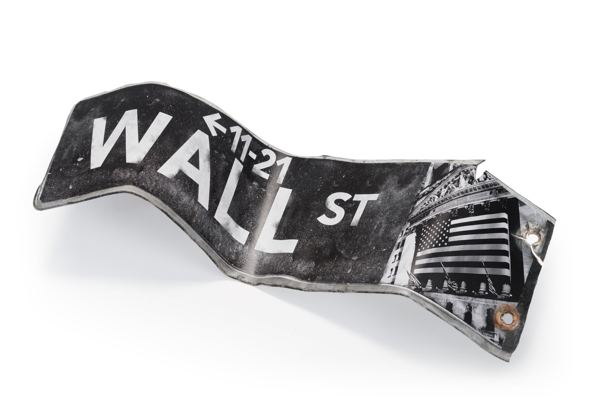 A bent Wall Street street sign. 
