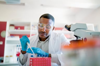 scientist-with-pippette-getty