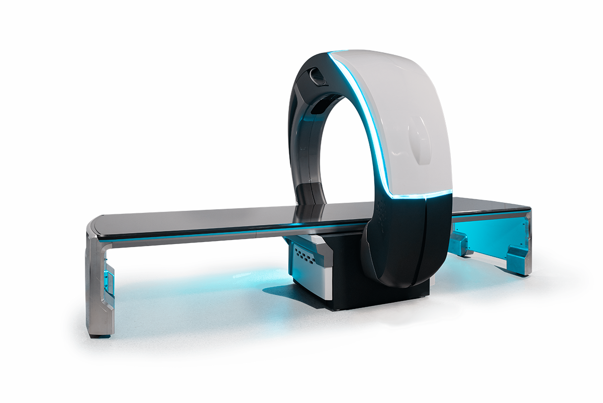 Nano-X device consisting of a 6-foot metal cot and a large semi-circle X-ray device that moves back and forth around the cot.