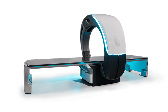 Nano-X device consisting of a 6-foot metal cot and a large semi-circle X-ray device that moves back and forth around the cot.