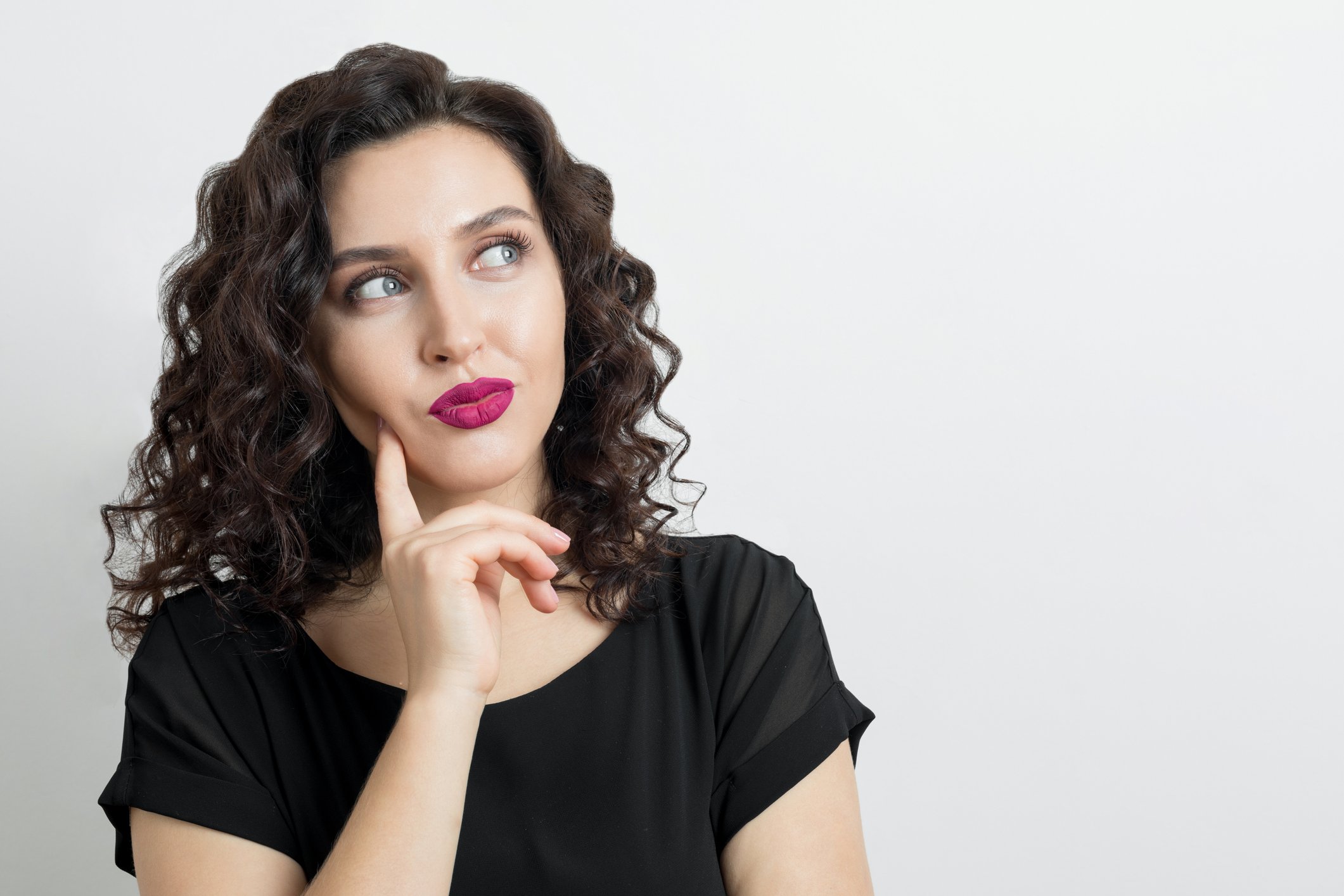 Woman looking thoughtful