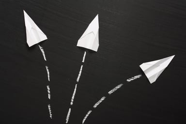 3 paper airplanes going up