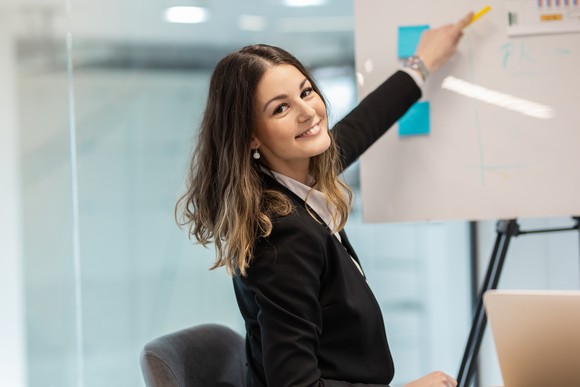 Woman showing growth presentation. 