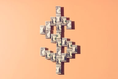 dollar sign made out of dollar bills