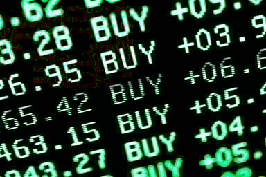 stock ticker screen with a list of buys