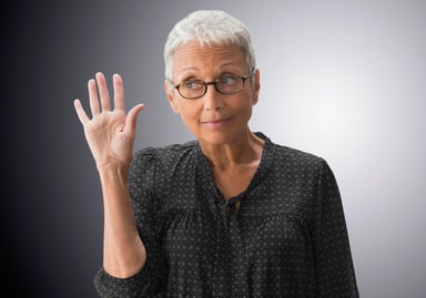 GettyImages-person raising hand with question