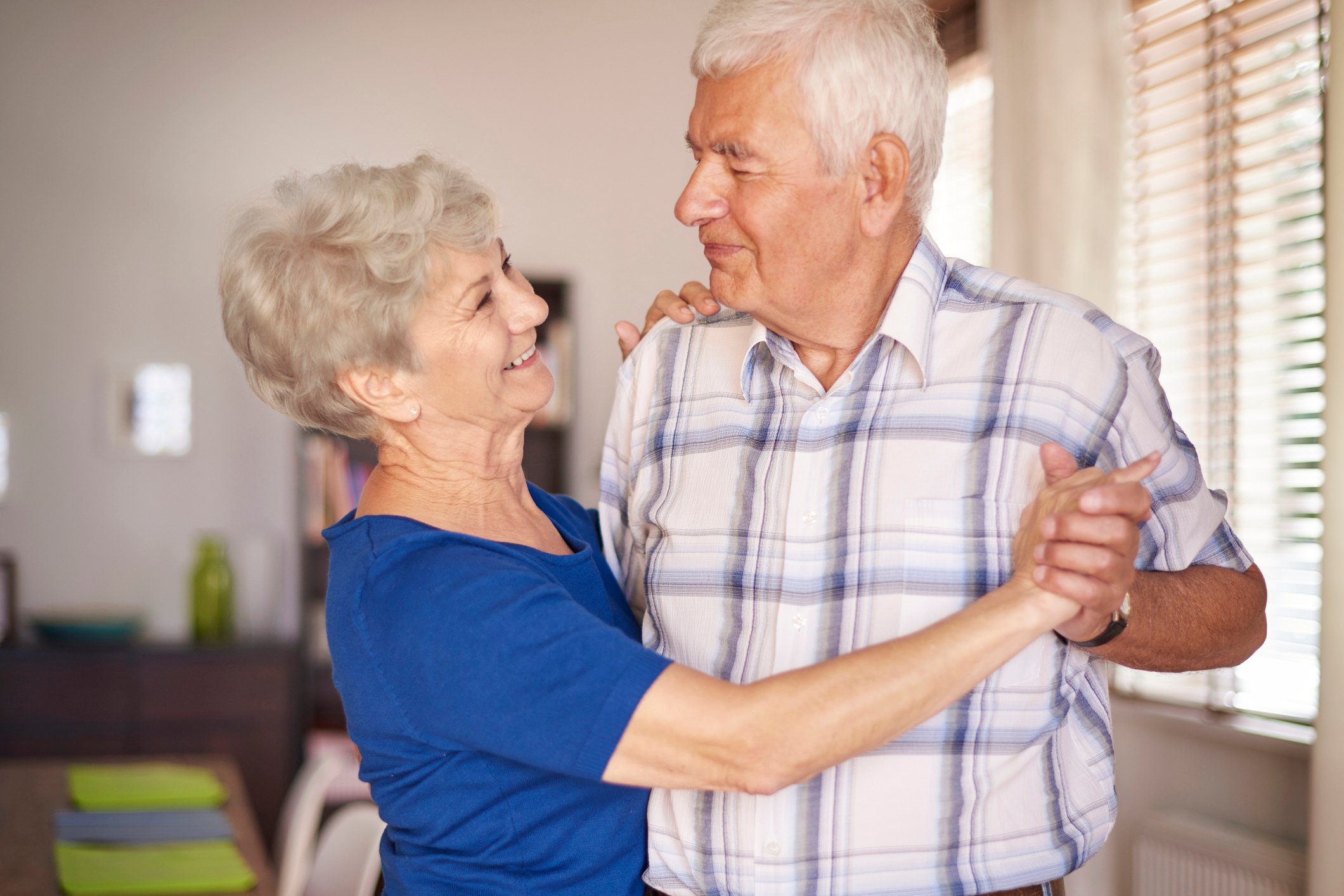 Old man and woman dancing