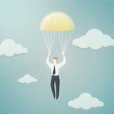 Man in tie parachuting.