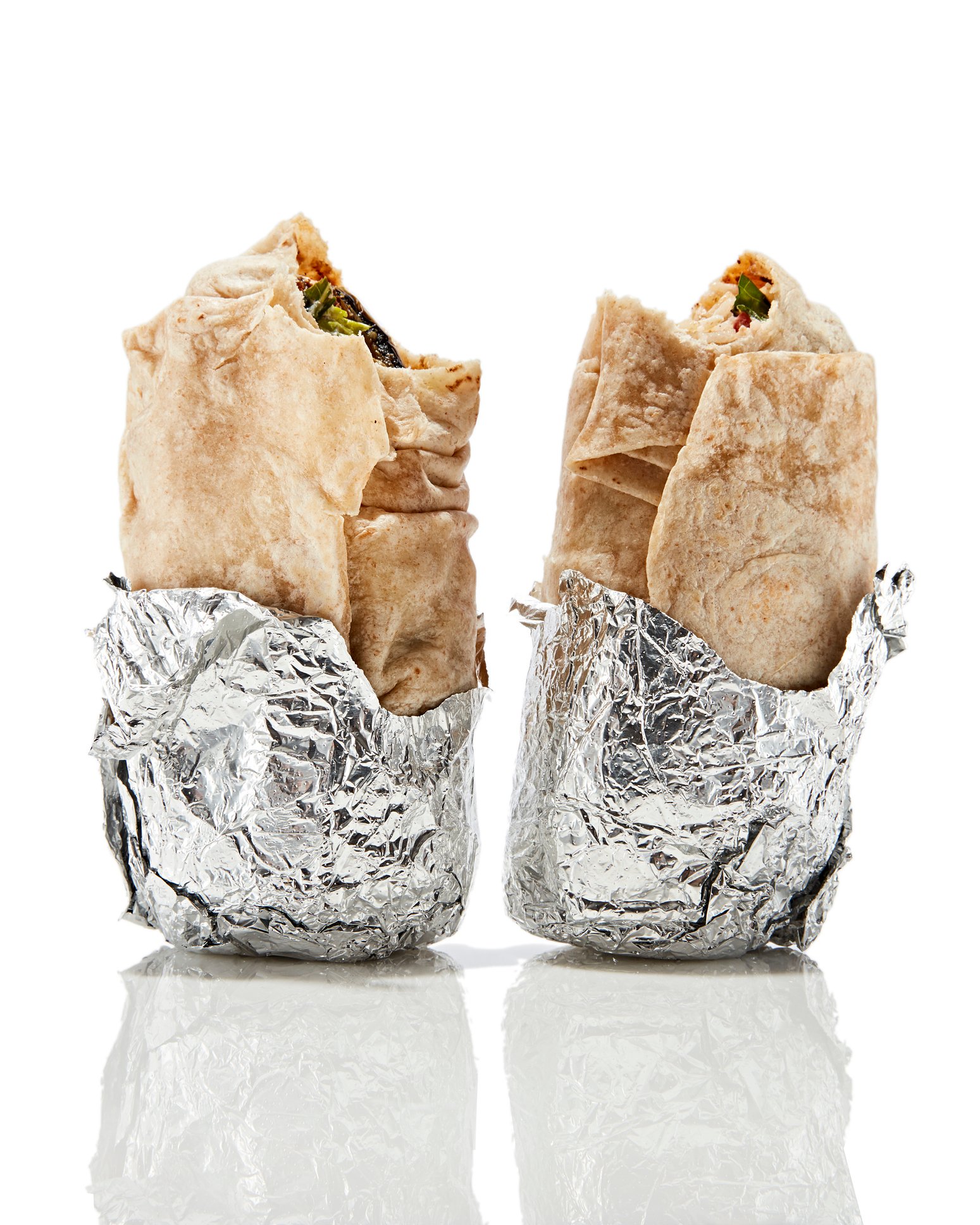 Two burritos standing up. 