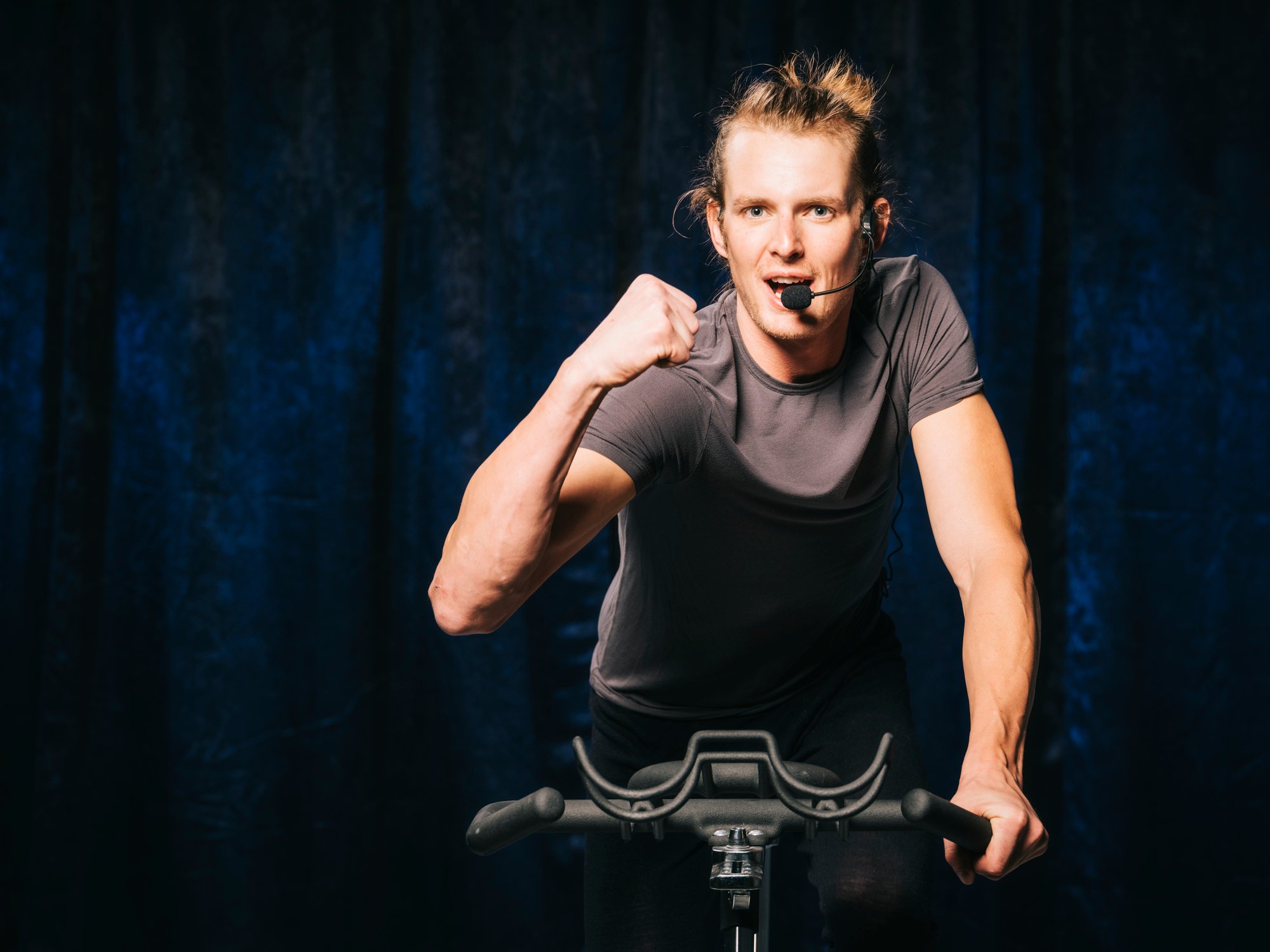 An activity leader on an exercise bike.