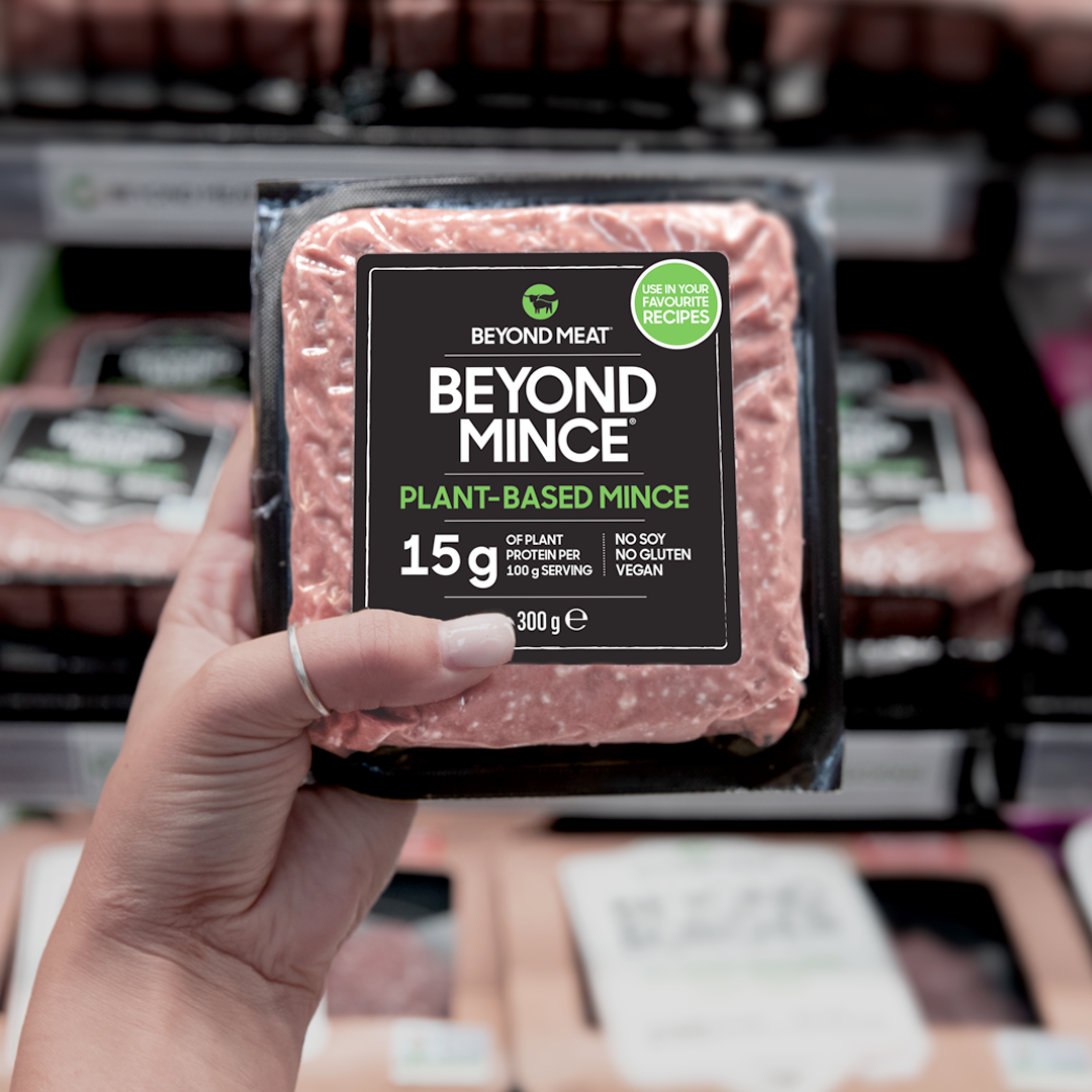 Hand holding packaged of Beyond Meat's Beyond Mince product
