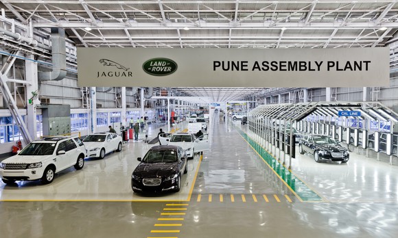 A 2013 file photo showing completed vehicles at Jaguar Land Rover's factory in Pune, Maharashtra state, India.