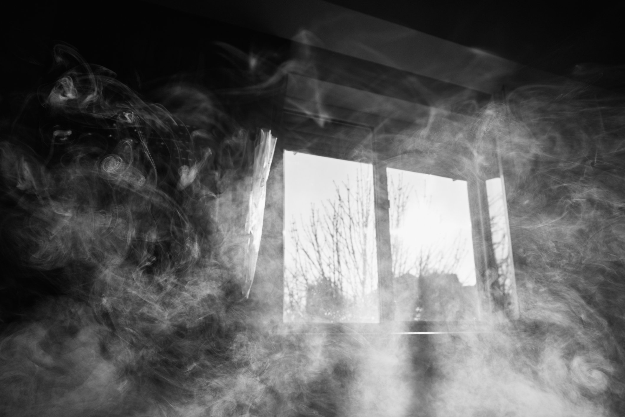 Smoke filled room in black and white