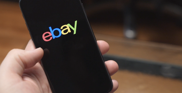 The eBay logo displayed on a smartphone screen.