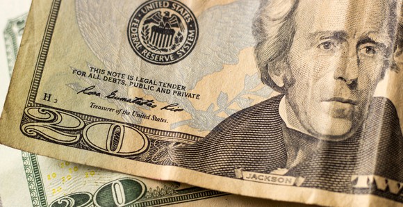 Close-up photo of a couple of $20 bills.