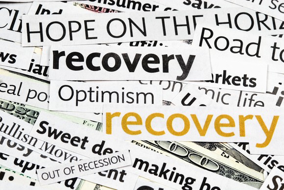 A collage of clippings from magazines including words like "recovery" and "optimism."