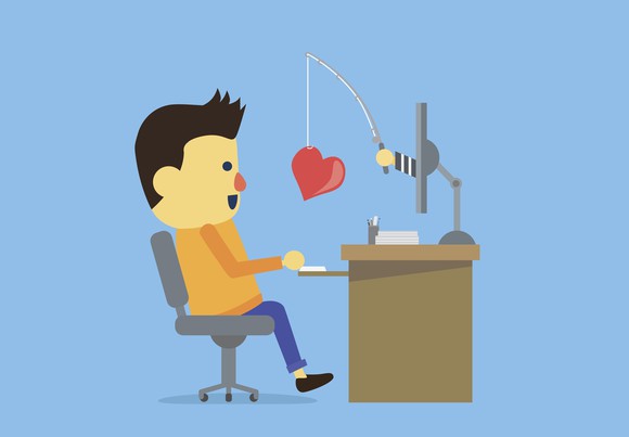 Animated male sitting at a computer screen. A hand holding a fishing rod protrudes from the screen with a heart dangling on the end